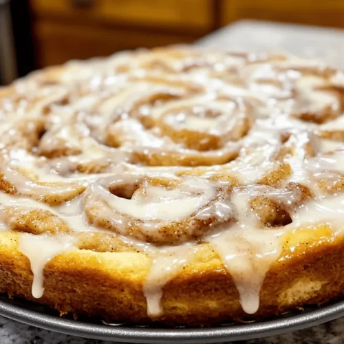 Cinnamon rolls are a beloved breakfast treat, known for their soft, pillowy texture and warm, spicy aroma. But what if you could capture all the delightful flavors of cinnamon rolls in a cake form? Enter the ooey gooey cinnamon roll cake—a dessert that combines the best of both worlds. This decadent cake features a rich, buttery base swirled with a luscious cinnamon filling and topped with a creamy glaze, making it an irresistible choice for any occasion. Whether you're celebrating a special event or simply indulging in a cozy day at home, this cake brings comfort and joy to your table.