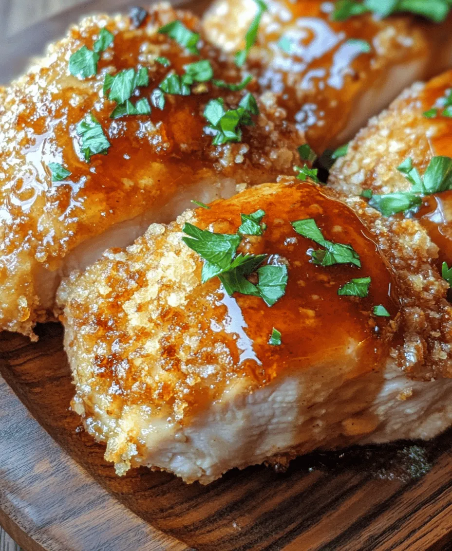 Baked Crunchy Hot Honey Chicken is a mouth-watering dish that beautifully marries the satisfying crunch of perfectly breaded chicken thighs with the sweet and spicy explosion of hot honey sauce. In an era where health-conscious eating is gaining momentum, this recipe stands out as a delightful alternative to traditional fried chicken without compromising on flavor or texture. The chicken boasts a crispy exterior while remaining tender and juicy on the inside, making it a crowd-pleaser for both families and entertaining guests.