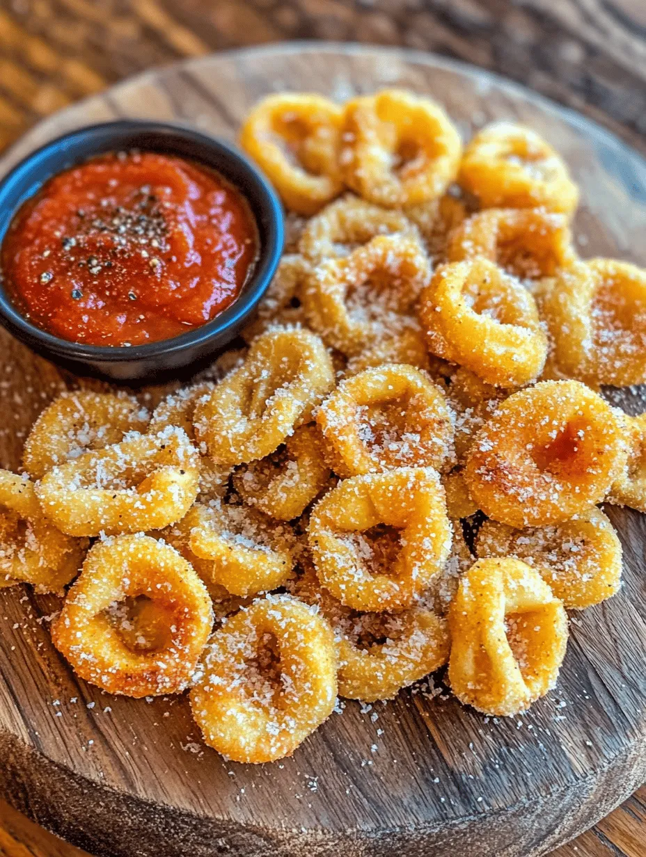To fully appreciate our Crispy Parmesan Fried Tortellini, it’s essential to delve into the history and versatility of tortellini. This pasta type traces its origins back to the Emilia-Romagna region of Italy, particularly in cities like Bologna and Modena. The shape of tortellini is often likened to a small ring or navel, which is said to have been inspired by the goddess Venus. According to local legends, the first tortellini was crafted by a chef who was inspired by the beauty of a woman and sought to replicate her navel in pasta form.