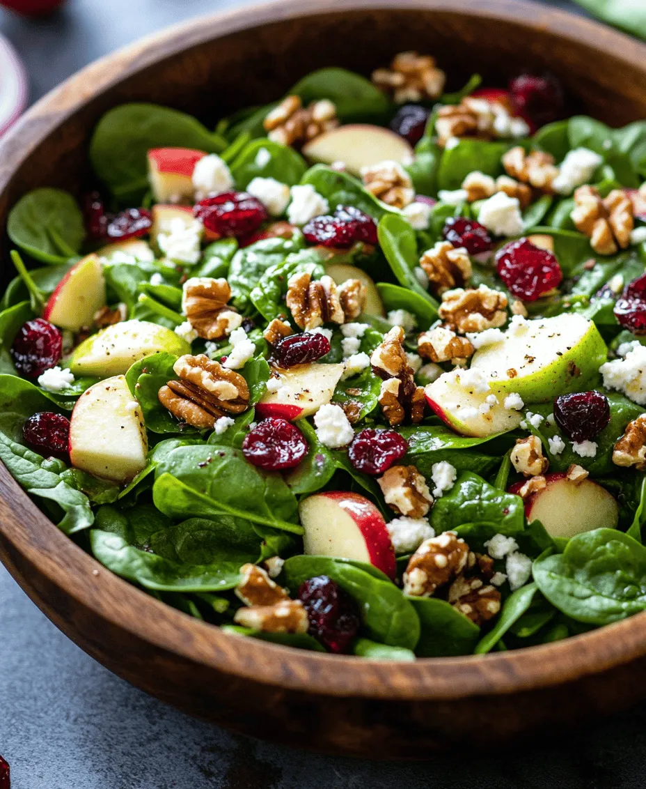 At the base of our Apple Cranberry Salad lies fresh spinach, a leafy green that boasts a wealth of health benefits. Spinach is renowned for its high vitamin content, particularly vitamins A, C, and K, which are vital for maintaining healthy skin, boosting the immune system, and supporting bone health. Additionally, spinach is rich in antioxidants, which help combat oxidative stress in the body. The crisp, tender leaves of spinach serve as a perfect foundation for salad, providing a refreshing and nutritious base that pairs beautifully with the sweet and tart flavors of apples and cranberries.