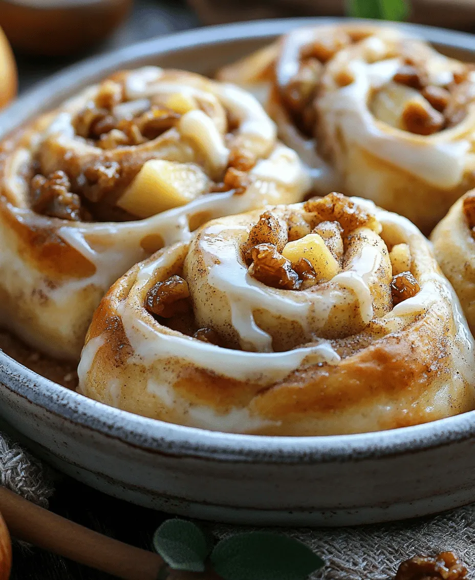 Cinnamon rolls have long been cherished as a breakfast staple and a delightful treat, known for their soft, pillowy texture and warm, aromatic spices. This classic pastry has inspired countless variations, each adding a unique twist to the traditional recipe. One such delightful twist is the Apple Pie Cinnamon Roll Delight, which ingeniously combines the comforting flavors of apple pie with the beloved cinnamon roll. Imagine sinking your teeth into a warm, gooey roll infused with the sweet essence of spiced apples and topped with a luscious cream cheese frosting.